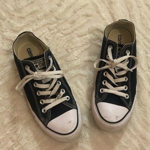 Converse black and white shoes.